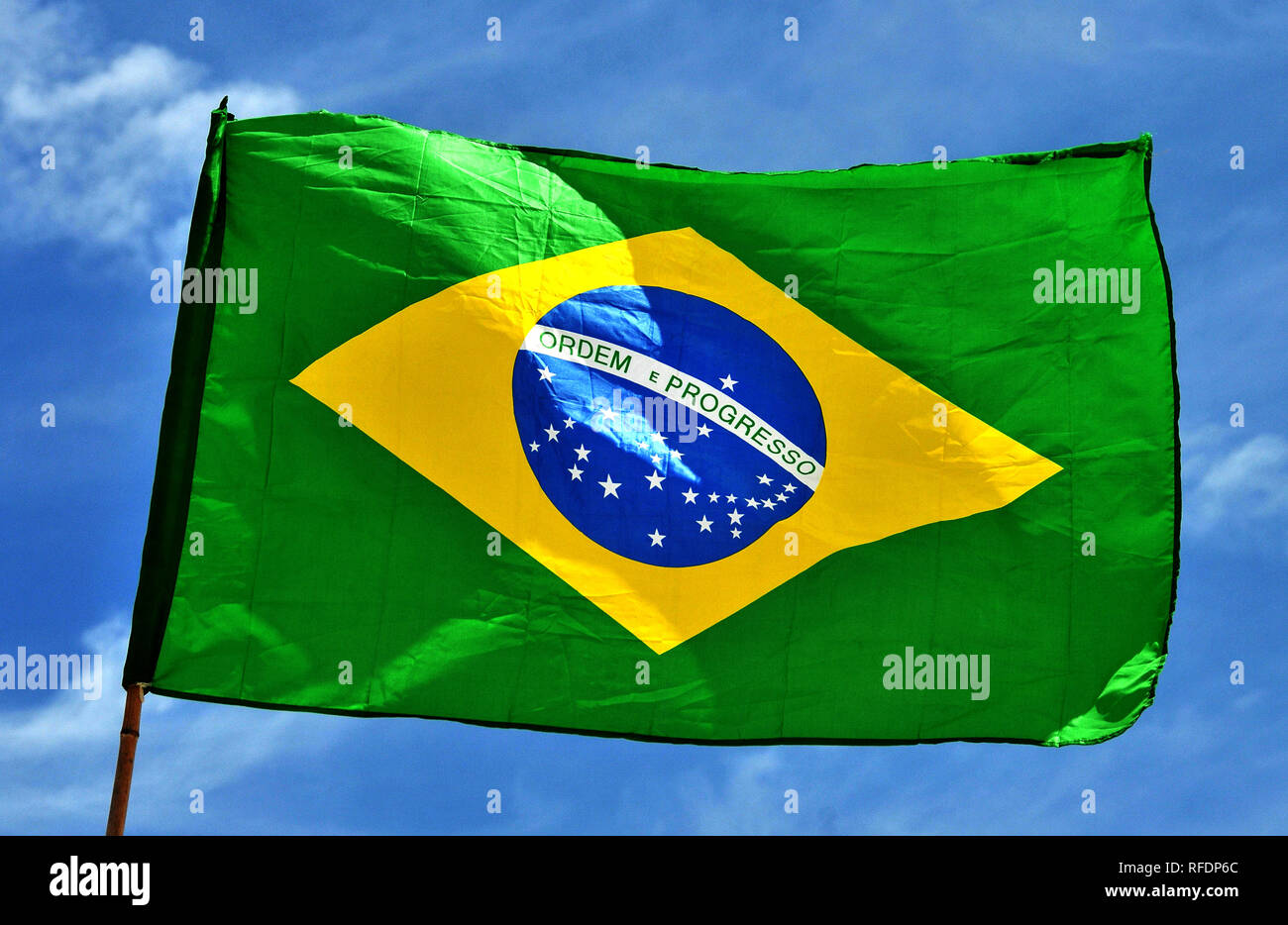 brazilian flag in blue sky Stock Photo