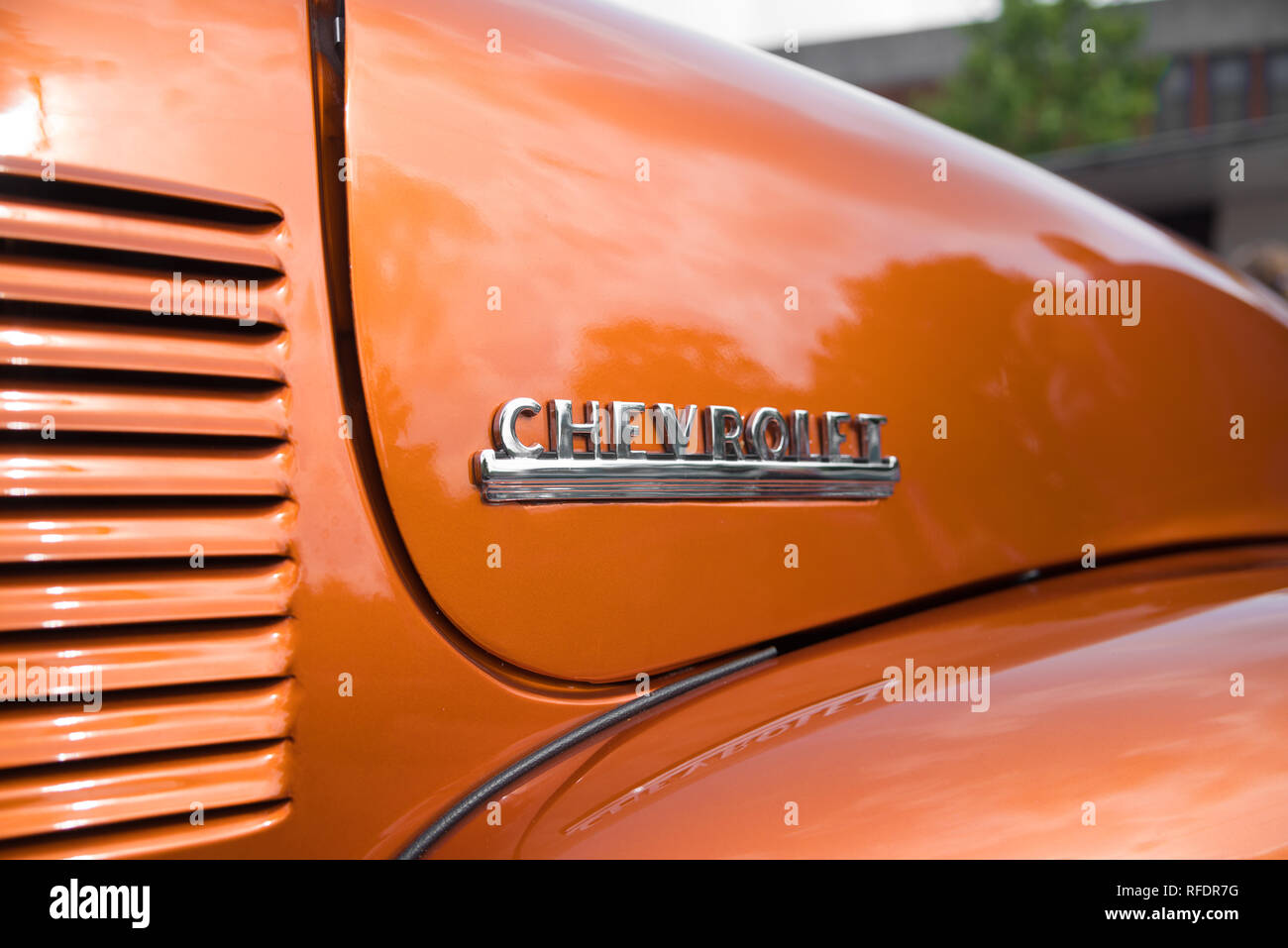 NIJVERDAL, NETHERLANDS - SEPTEMBER 17, 2017: Closeup of a chevrolet logo on an orange brown oldtimer car. Stock Photo