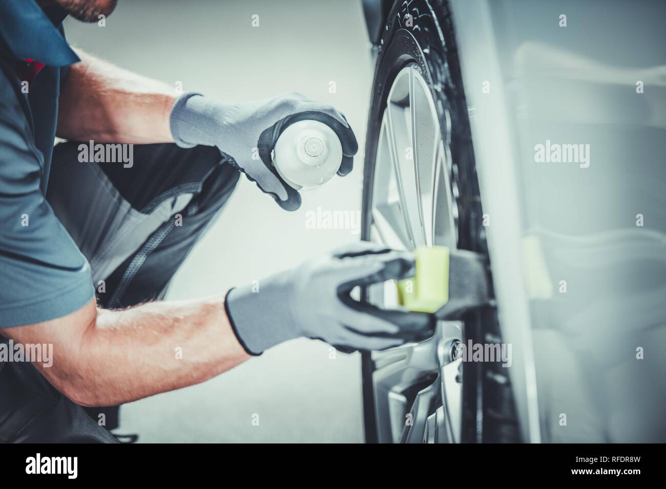 Car Wheels Pro Cleaning Using Professional Detergents. Vehicle Detailed Clean. Stock Photo