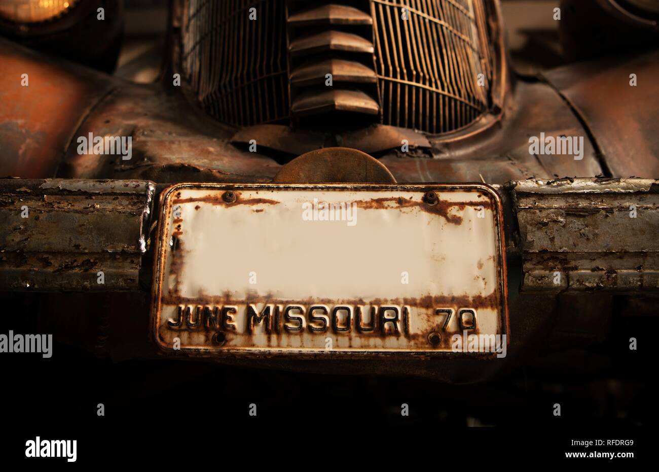 Rusty Classic Car Registration Missouri Plate. Vintage Transportation Concept. Stock Photo