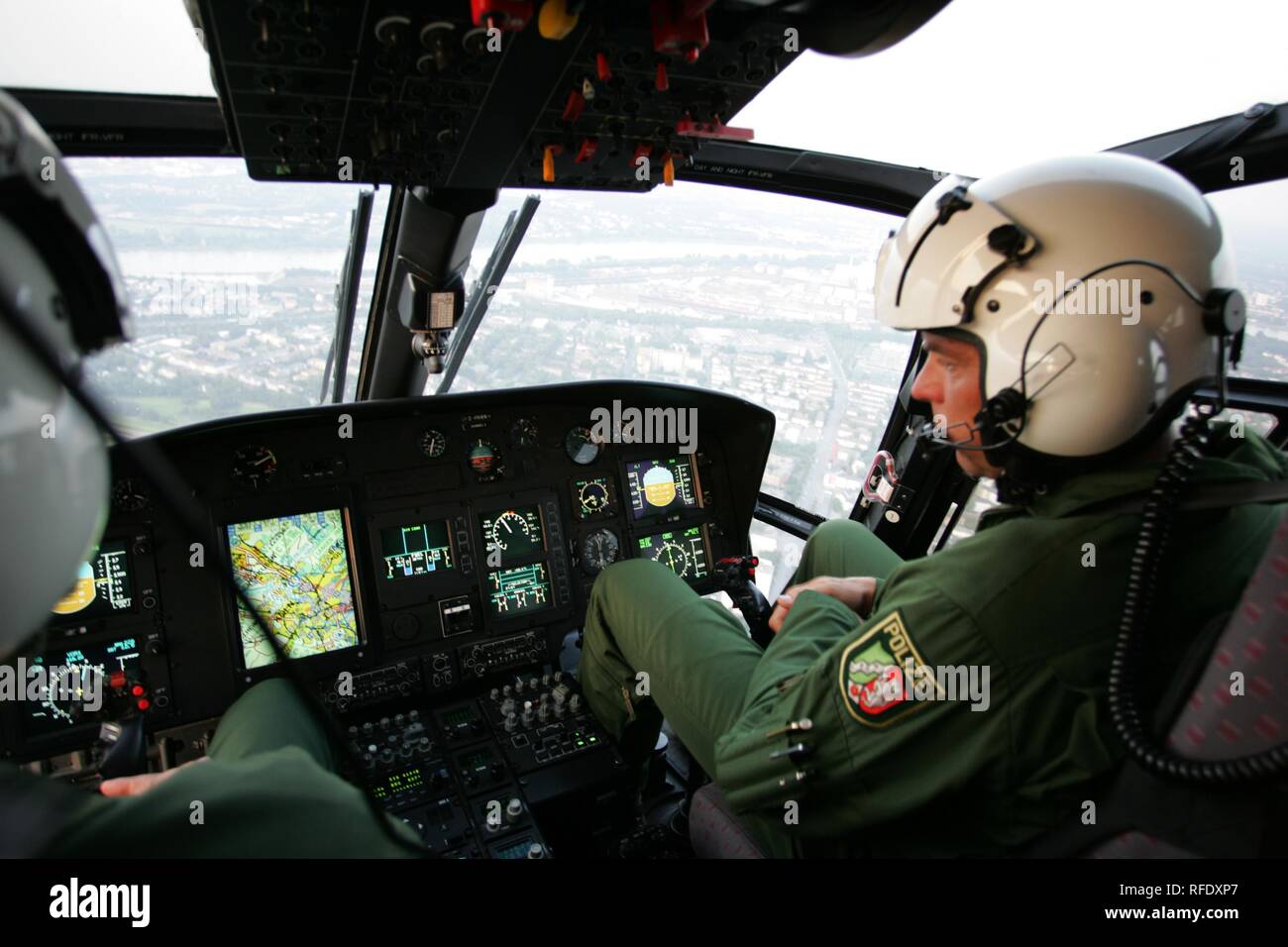 Pilotes in cockpit, Police helicoper, Eurocopter EC 155 Stock Photo