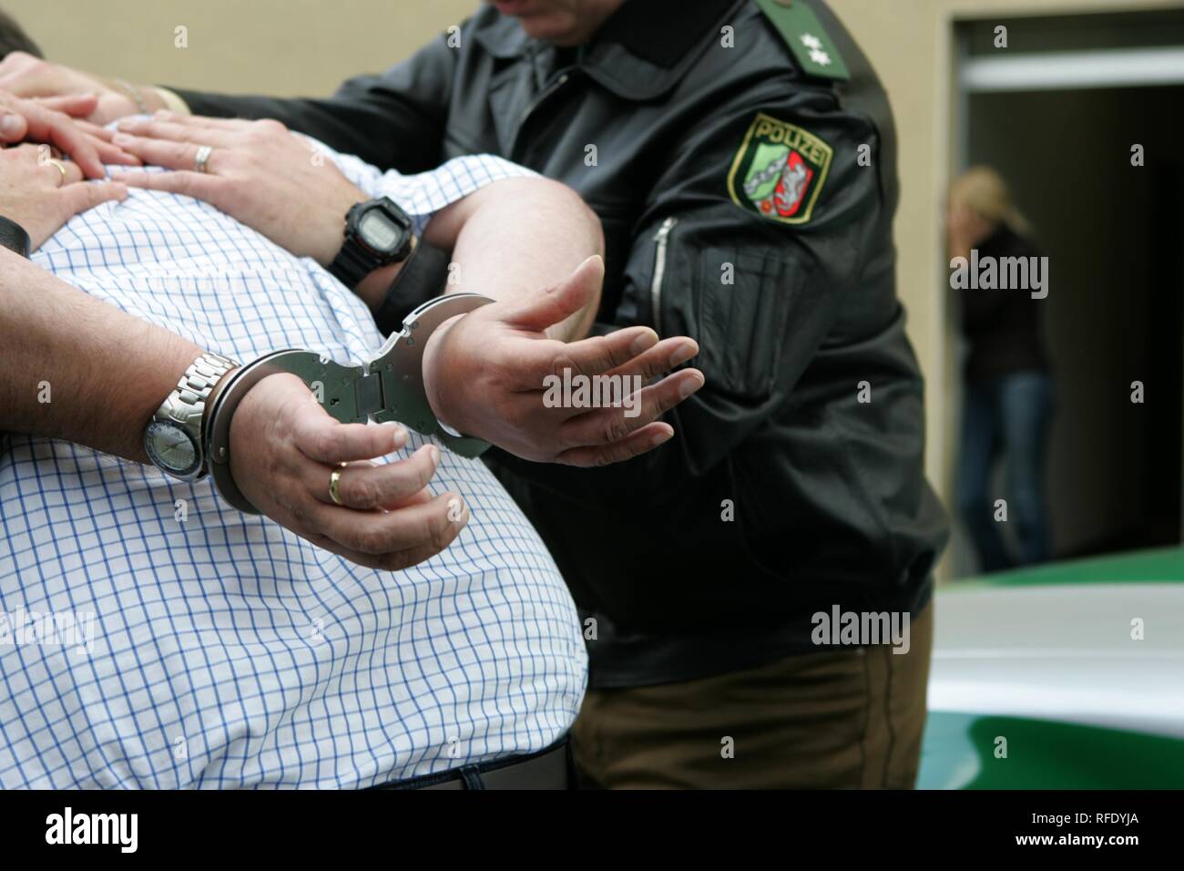 (posed situation) arrest of a violent husband, Unna, Germany Stock Photo