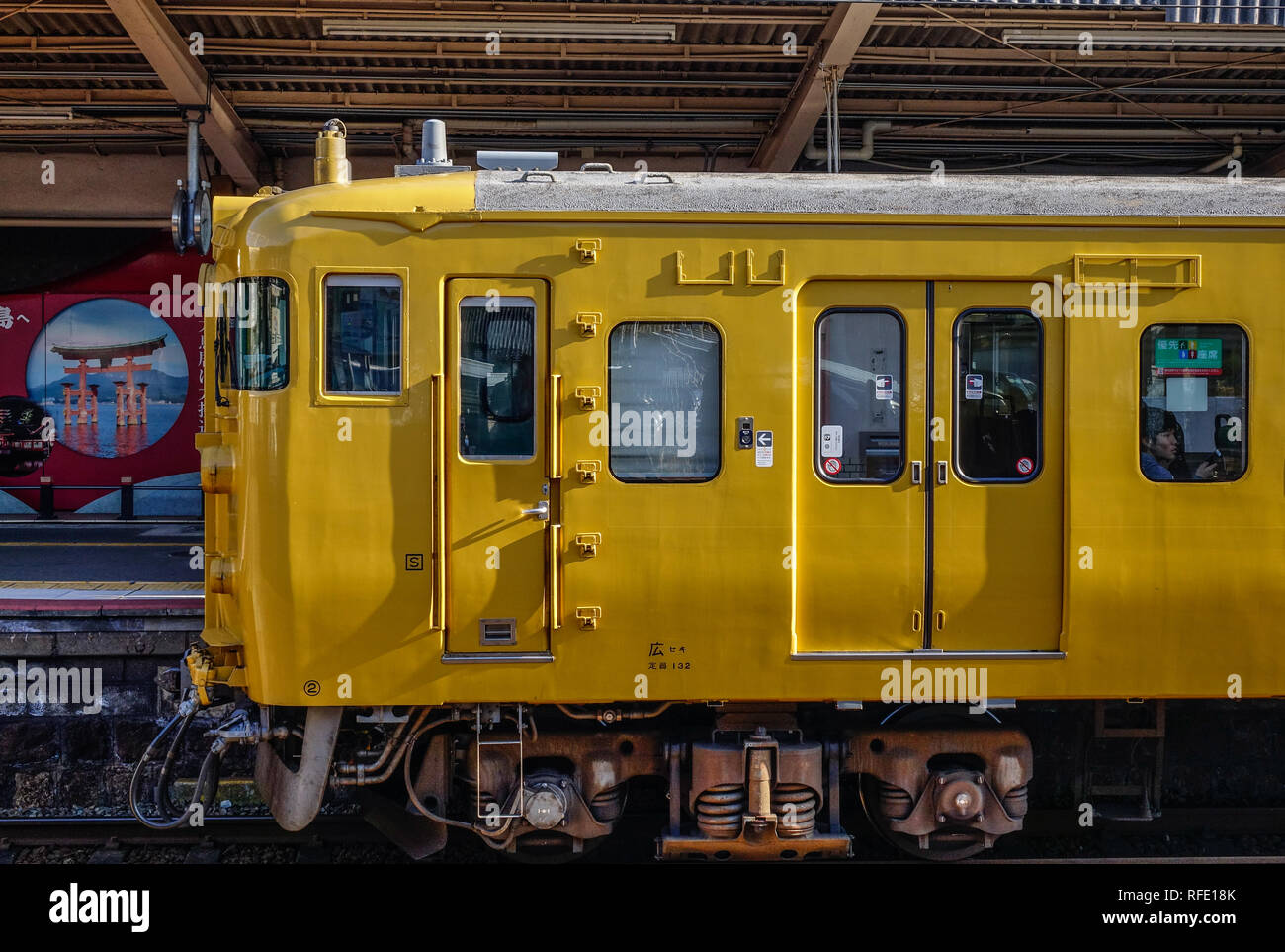 Hiroshima, Japan - Dec 3, 2016. Train stopping at railway station in ...