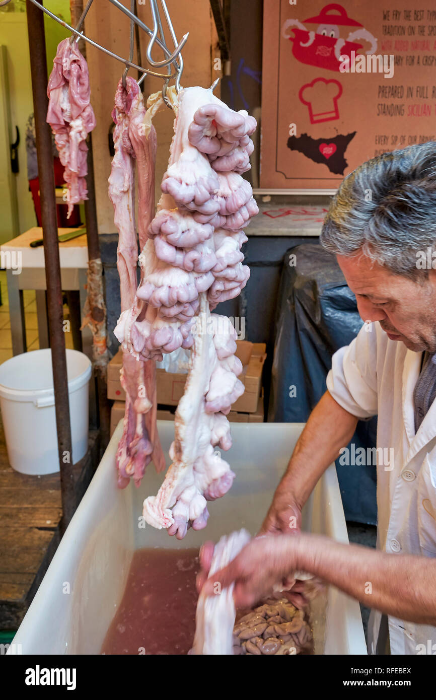 Piscaria, the street daily market in Catania Sicily Italy. Fresh fish, meat, vegetables Stock Photo