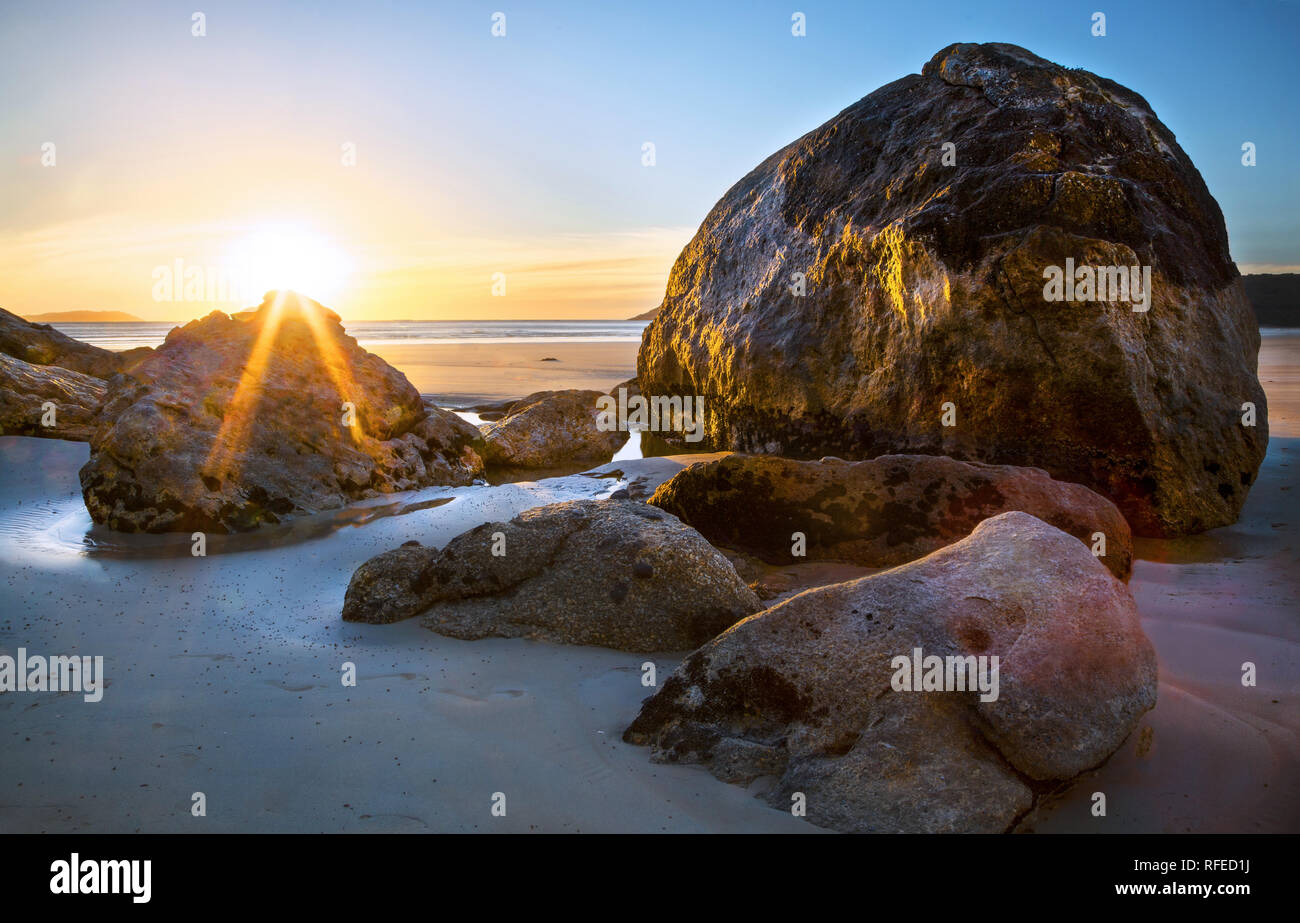 Wilsons Promontory National Park, Victoria, Australia: Sand ,sea and sun. The tranquil sunsets of Norman Bay. Sunset and Rocks. Stock Photo