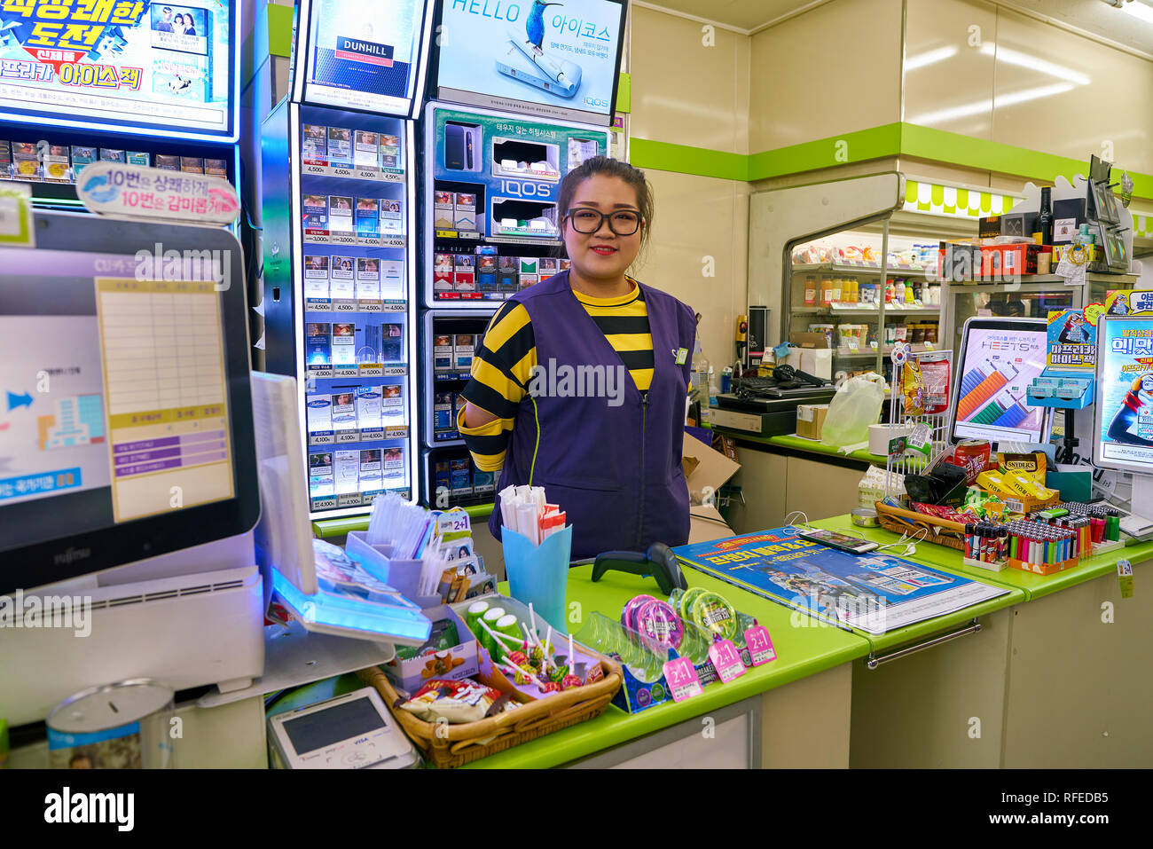 SEOUL, SOUTH KOREA - CIRCA JUNE, 2017: worker at CU convenience store