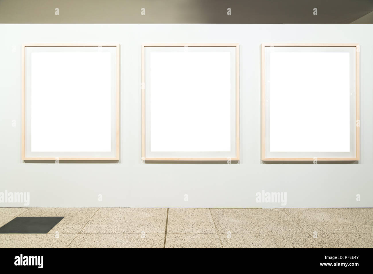 Blank empty golden frame on white background. Art gallery