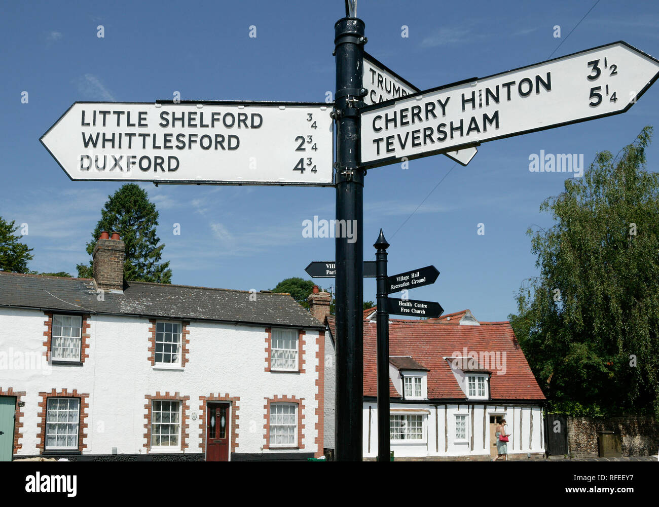 20th century black and white road traffic sign at Great Shelford routes to Cherry Hinton Duxford Little Shelford Teversham Whittlesford Cambridgeshire Stock Photo