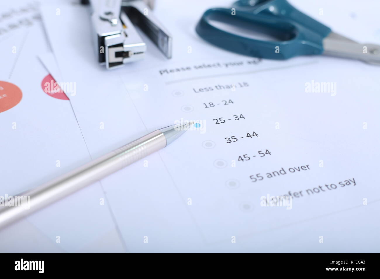 Picture of pen, stapler and scissor on the form. Stock Photo