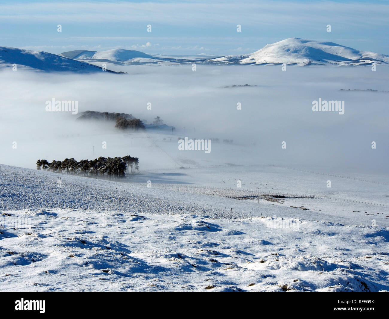 View towards Tinto, snowy Southern Uplands from Langlaw hill, near Broughton, Scotland Stock Photo