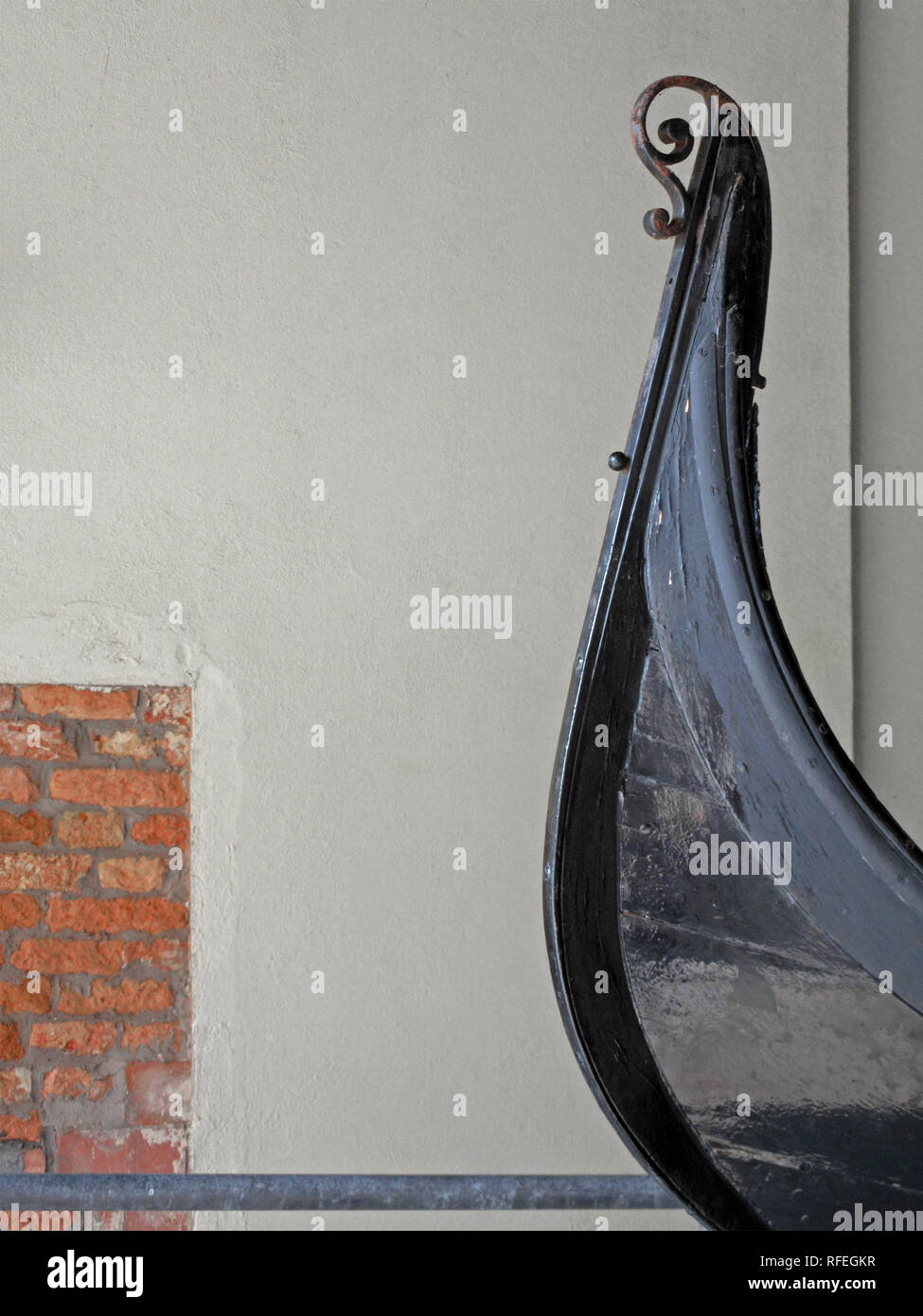 wooden black gondola prow with metal curl Stock Photo - Alamy