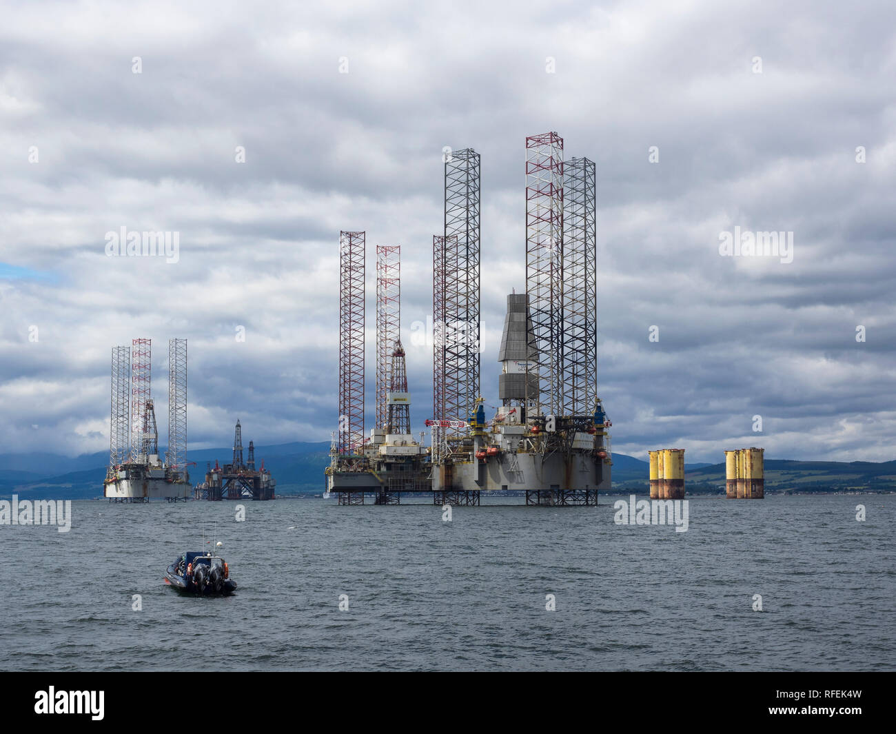 Oil rigs and platforms in the Cromarty Firth near Cromarty, Black Isle, Scotland Stock Photo