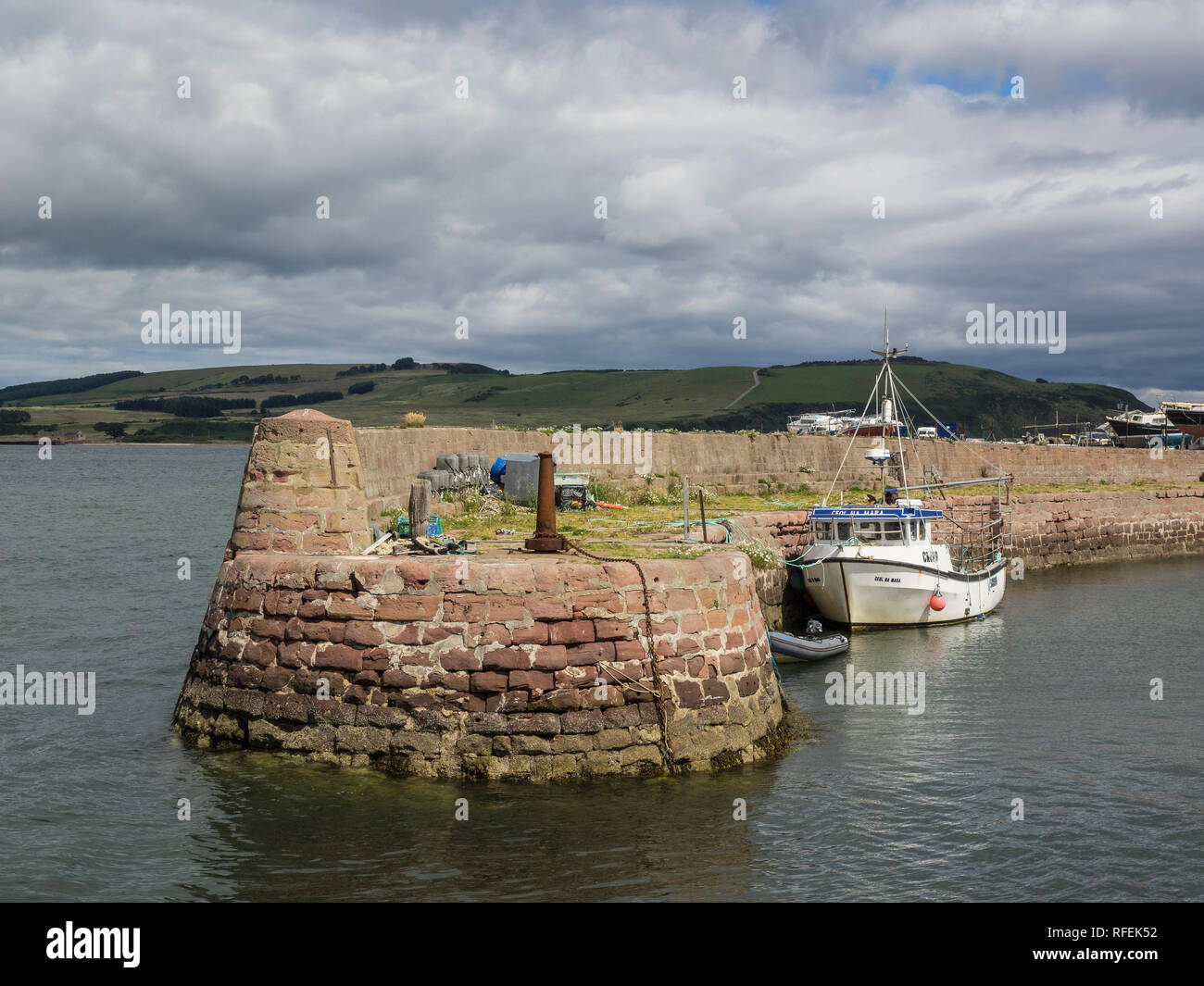 Boat moored at Cromarty Harbour, Cromarty, The Black Isle, Scotland Stock Photo