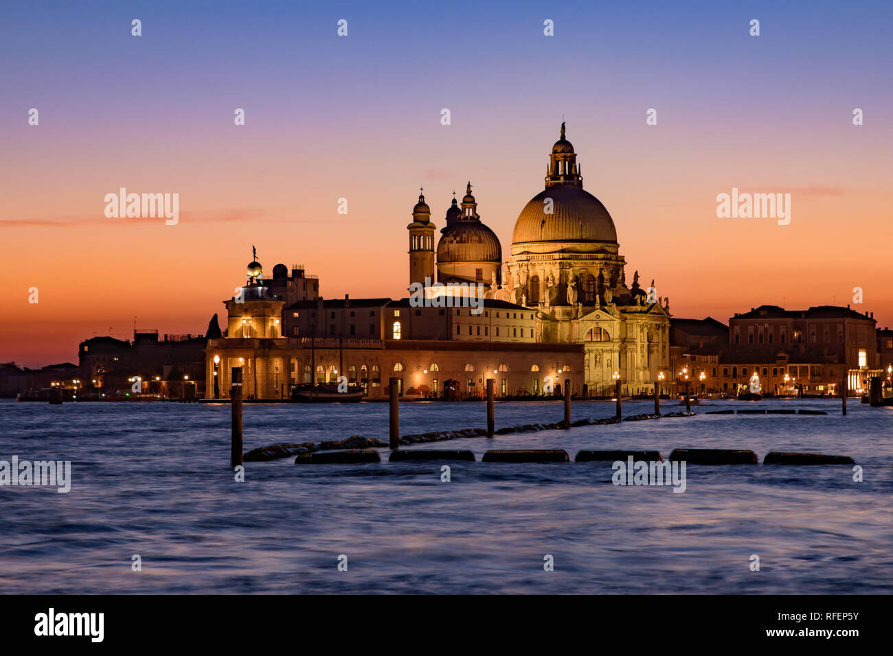 Santa Maria della Salute (Saint Mary of Health) at sunset time, a Catholic church in Venice, Italy Stock Photo