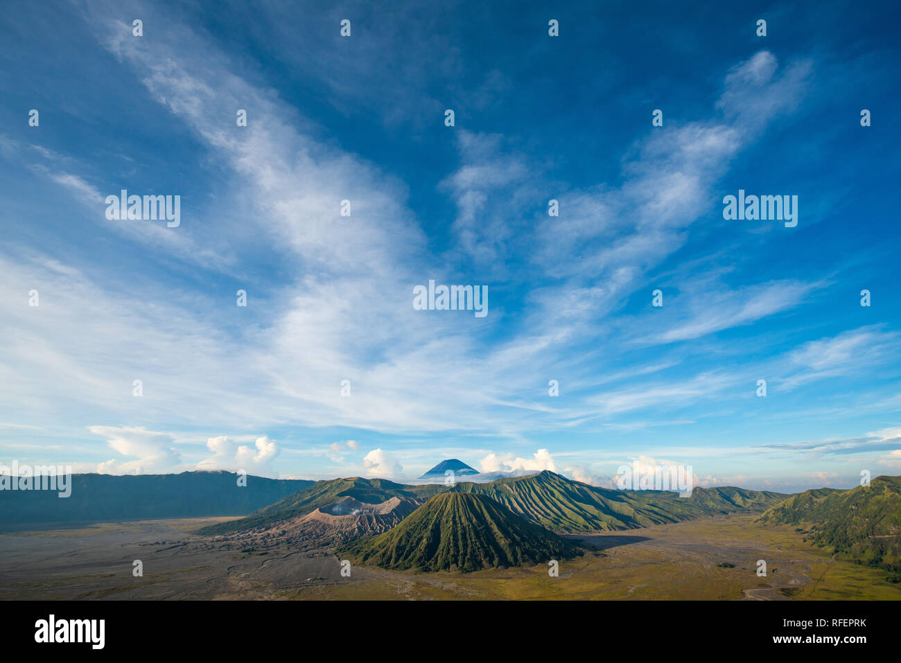 Bromo mountain , day time with dramatic cloud on blue sky Stock Photo