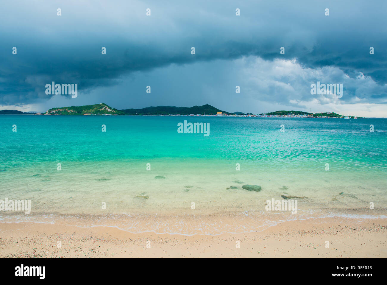 storm cloud background during raining. Dark Clouds. Huge black clouds on dark sky before a thunder-storm. Stock Photo