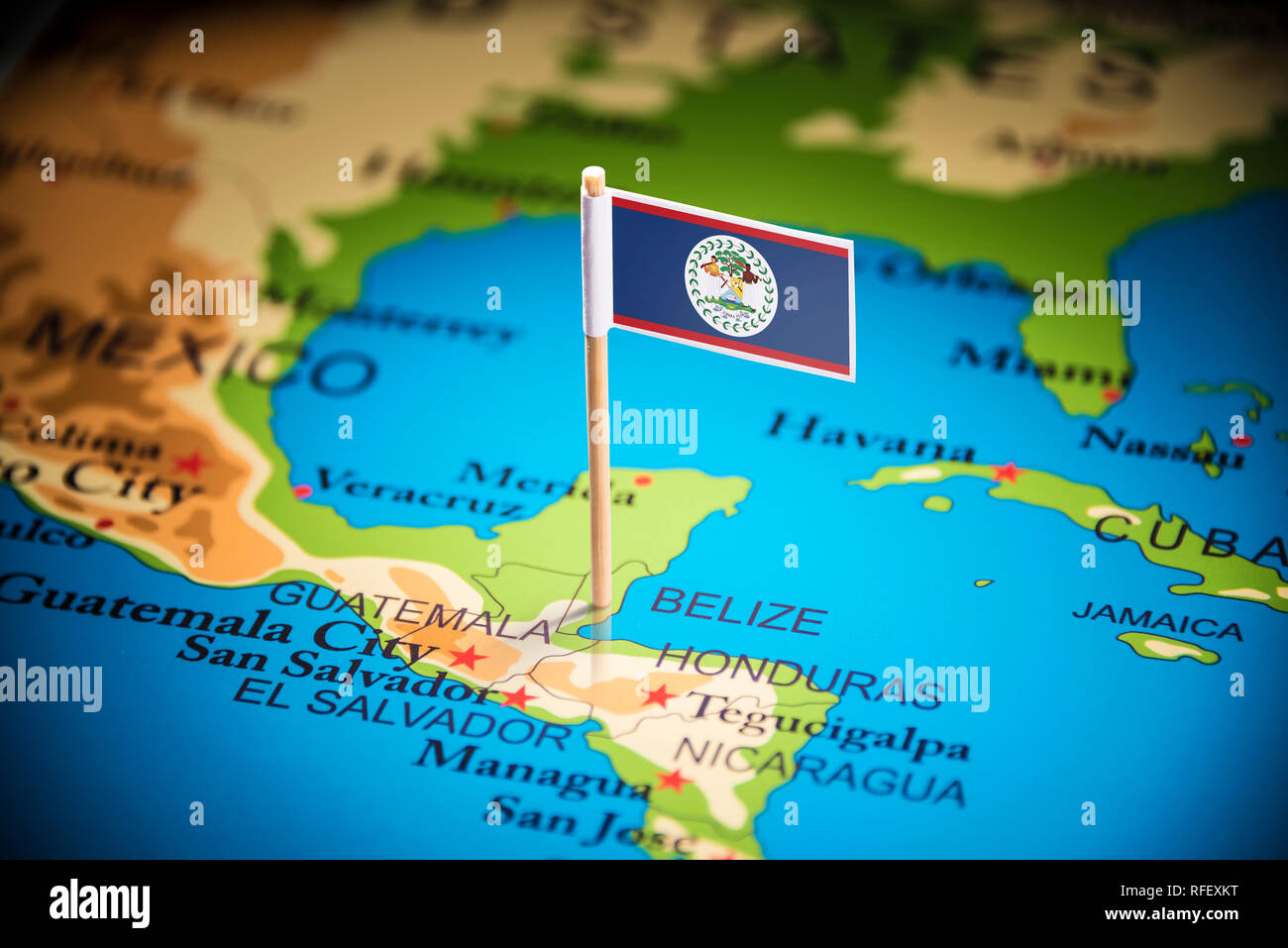 Belize marked with a flag on the map Stock Photo