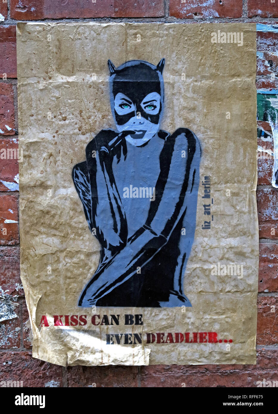 Cat Woman poster, A Kiss can be deadlier, Manchester Northern Quarter, England, UK Stock Photo