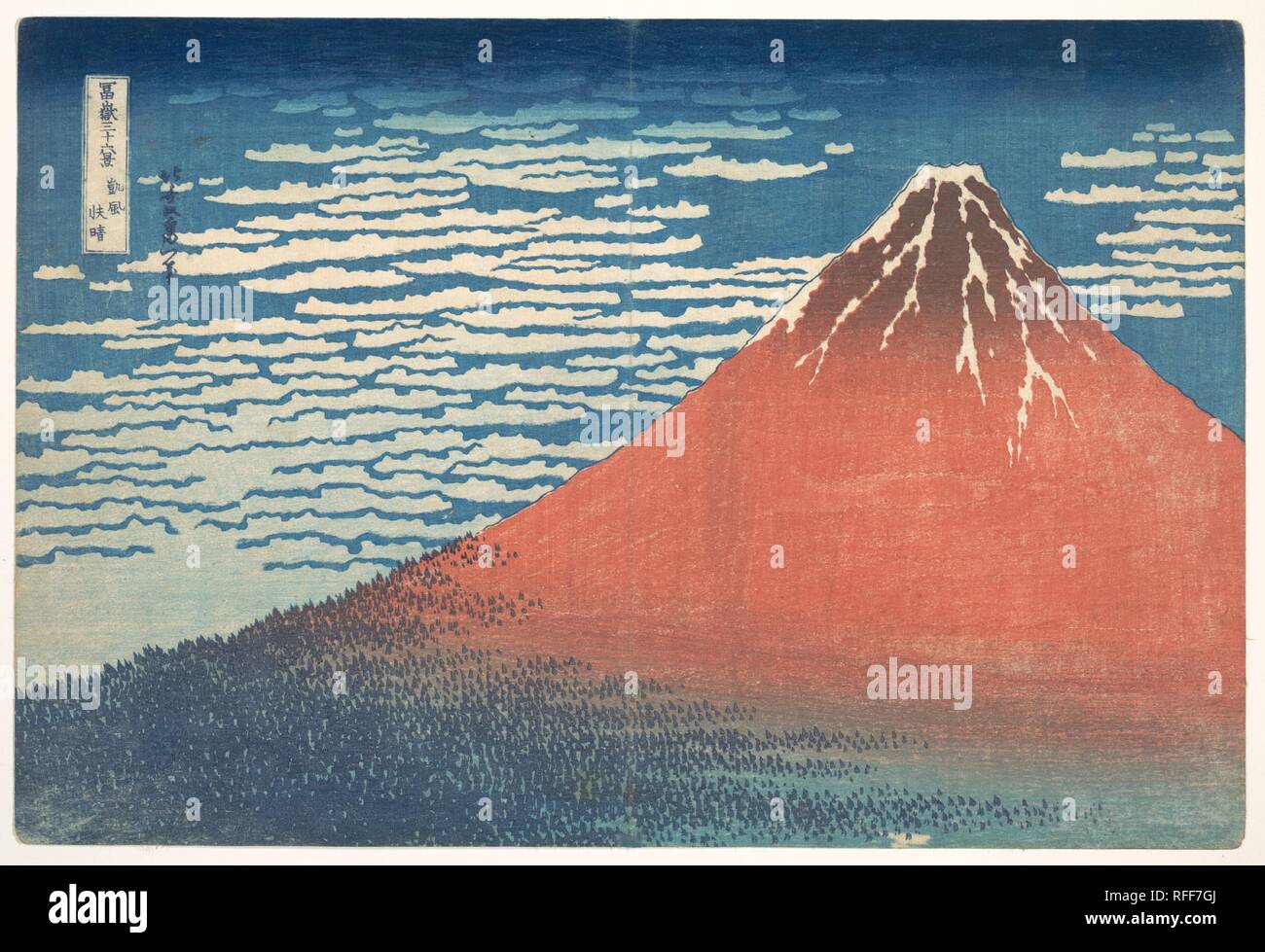 South Wind, Clear Sky (Gaifu kaisei), also known as Red Fuji, from the series Thirty-six Views of Mount Fuji (Fugaku sanjurokkei). Artist: Katsushika Hokusai (Japanese, Tokyo (Edo) 1760-1849 Tokyo (Edo)). Culture: Japan. Dimensions: Oban 10 x 14 7/8 in. (25.4 x 37.8 cm). Date: ca. 1830-32.  Mount Fuji is said to have a reddish hue at dawn in early autumn. Known as 'Red Fuji,' this print presents Hokusai's uncompromising vision of Mount Fuji without a human presence. The majestic snow-capped Mount Fuji embodies an iconic spirituality that approaches the religious. Trees are reduced to tiny tria Stock Photo