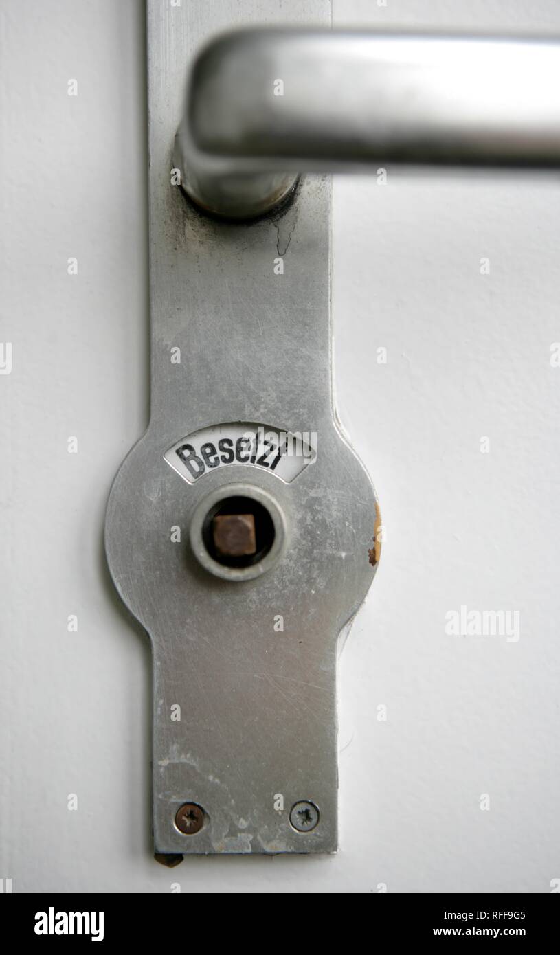 Toilet door. Occupied Stock Photo - Alamy