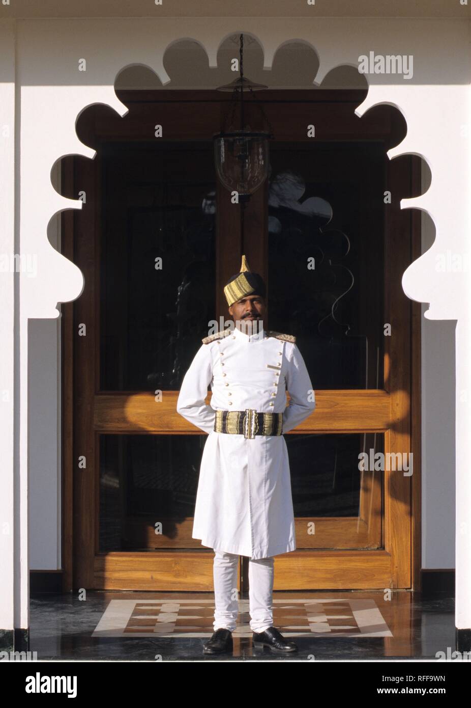 Oberoi Hotel The Trident, doorman, Udaipur, Rajasthan, India Stock Photo