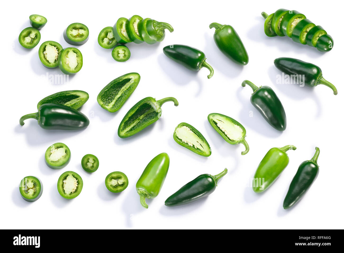 Jalapeno chile pepper (Capsicum annuum fruits), whole, chopped, halved