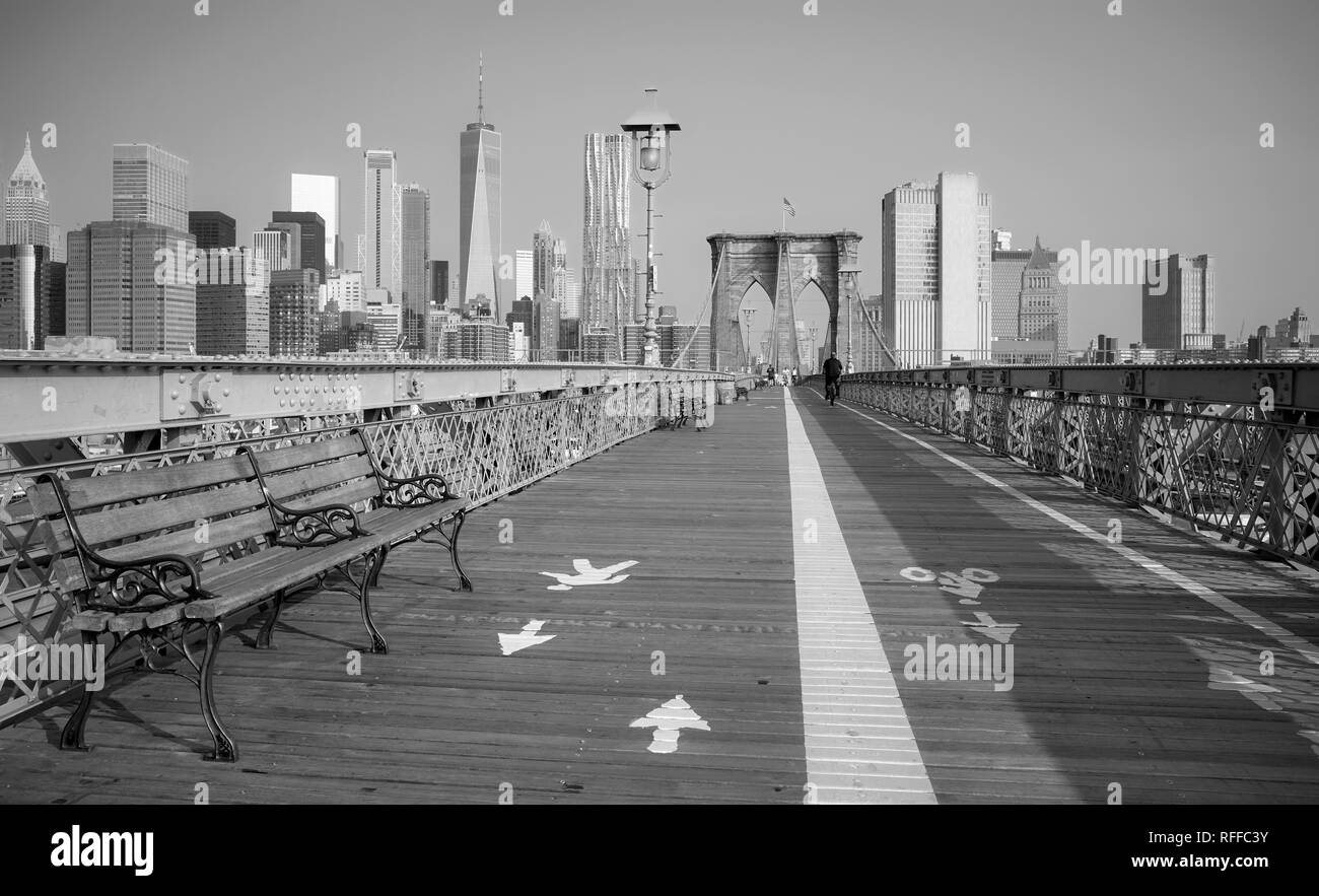 Black and white picture of Brooklyn Bridge with Manhattan skyline, NYC. Stock Photo
