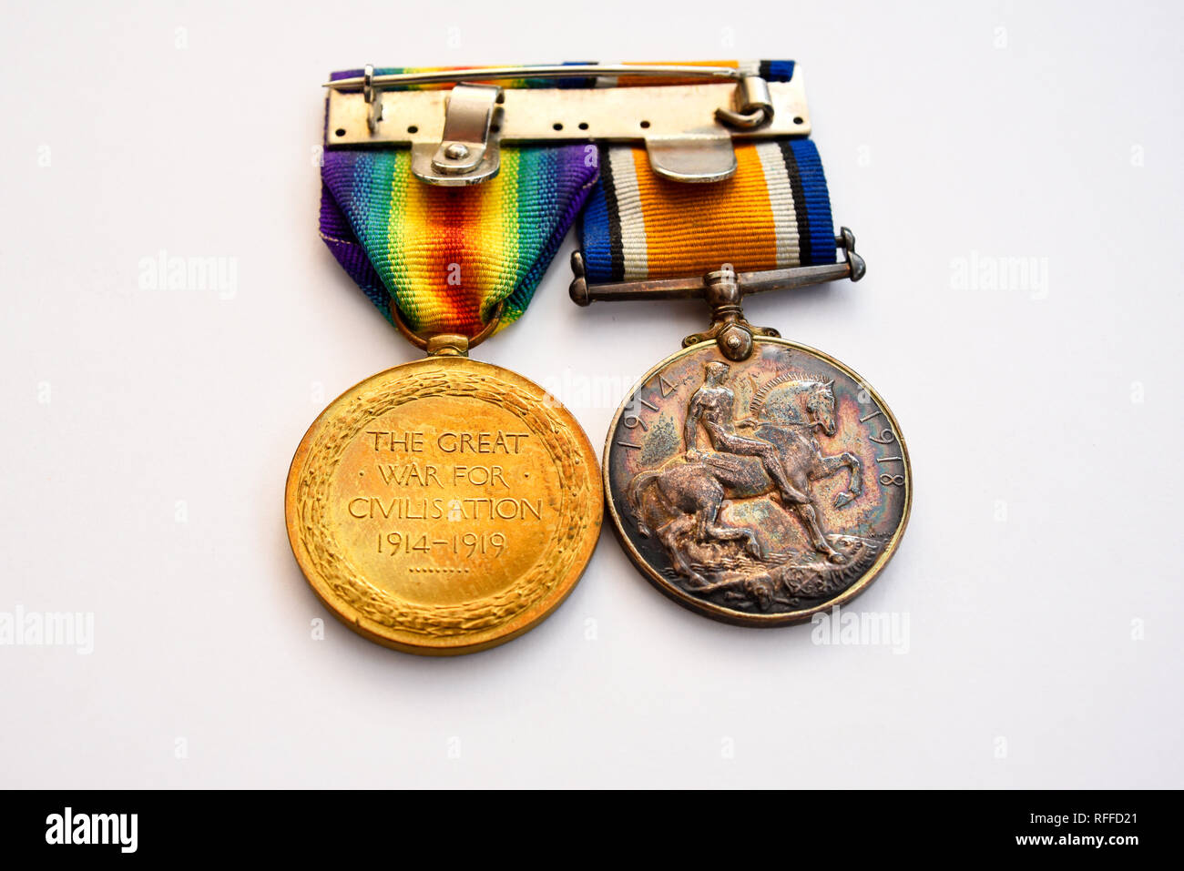 Great War war medals. British War Medal and Victory Medal. King George V. Campaign medal for UK and Allied forces from World War One. Ribbon bar Stock Photo