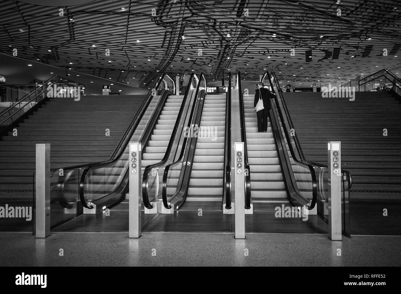 Delft, Netherlands, July 29, 2018:  Black and white picture of the hall with travelers in the Central Station Delft Stock Photo