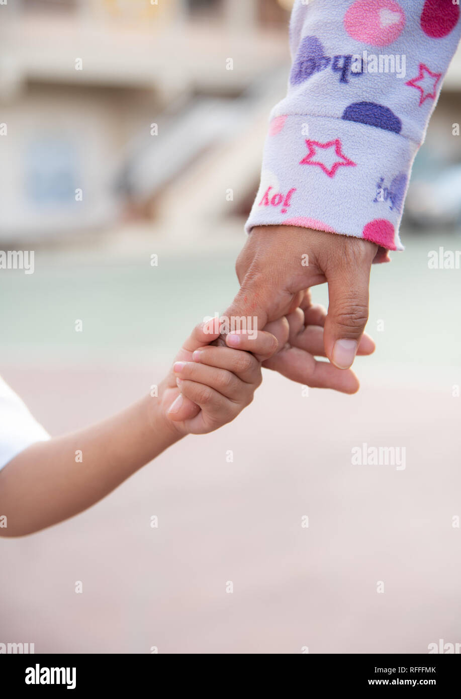 protection hand for support children hand Stock Photo Alamy