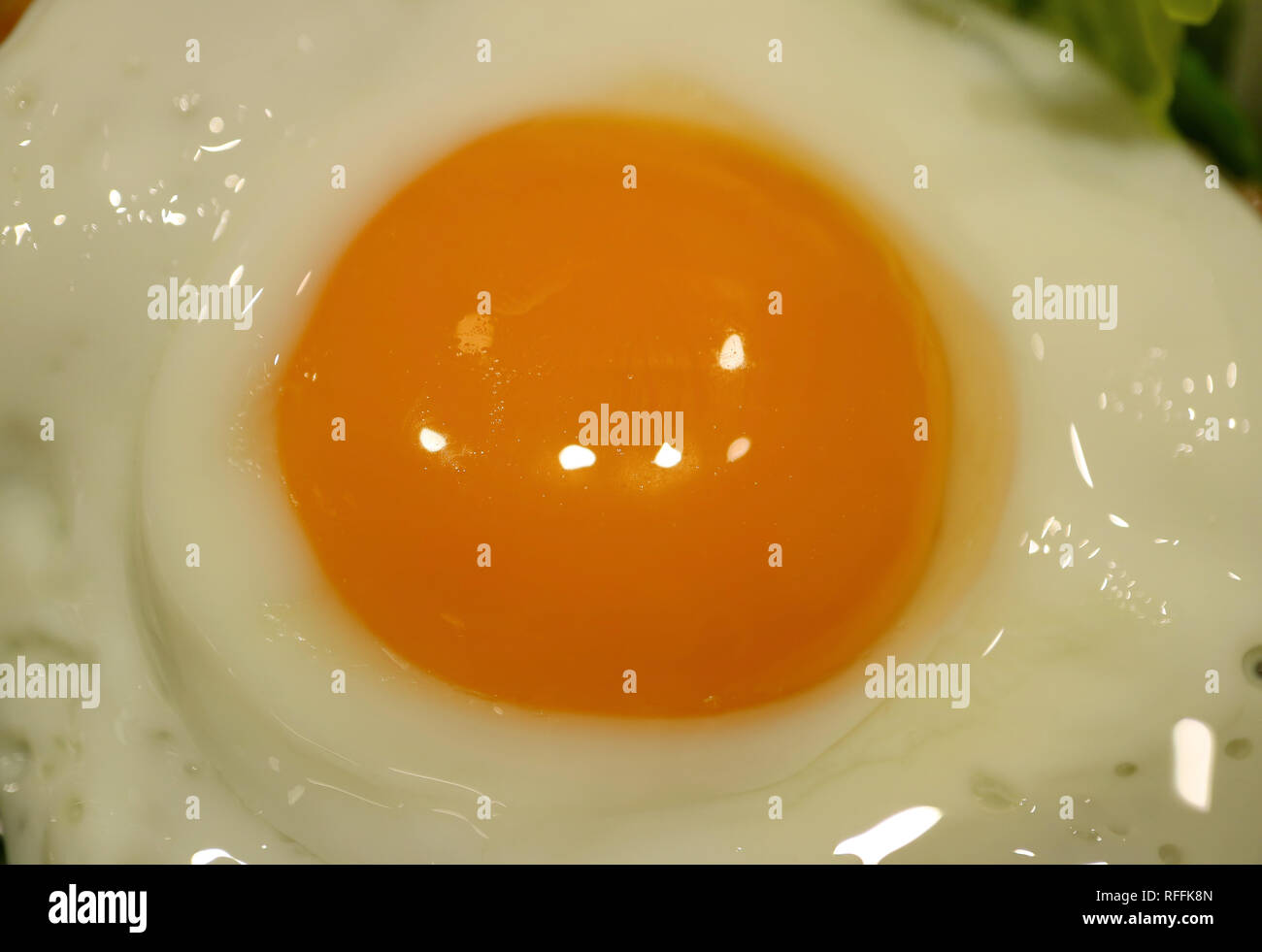 Closed up chicken egg yolk during fried on a pan Stock Photo