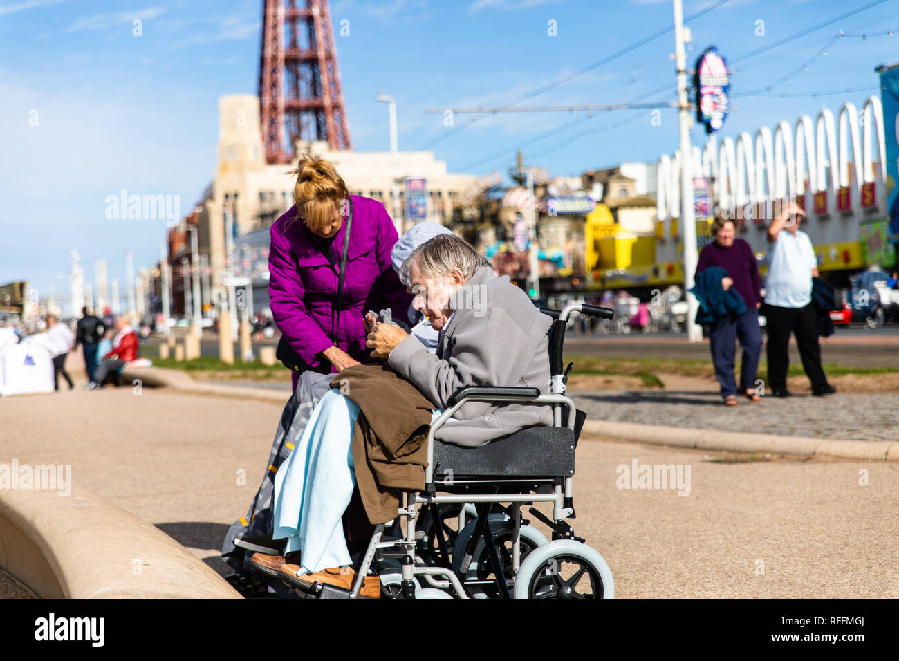 old couple enjoying a day out at the beach Stock Photo