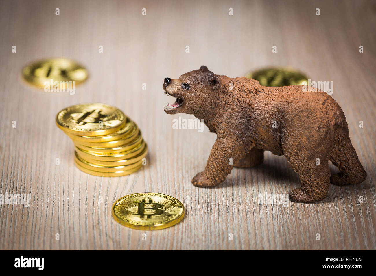 Cryptocurrency bitcoin bear figure on a wooden table. Bearish market trend  concept Stock Photo - Alamy