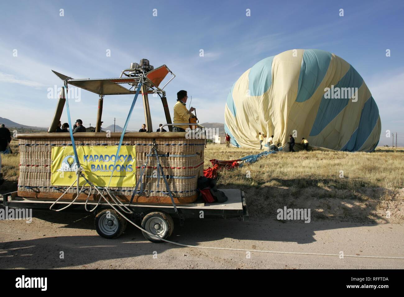TUR Turkey Cappadocia Hot Air Ballooning over Cappadocia. Balloons of 'Kapadokya Balloons'. Landing Stock Photo
