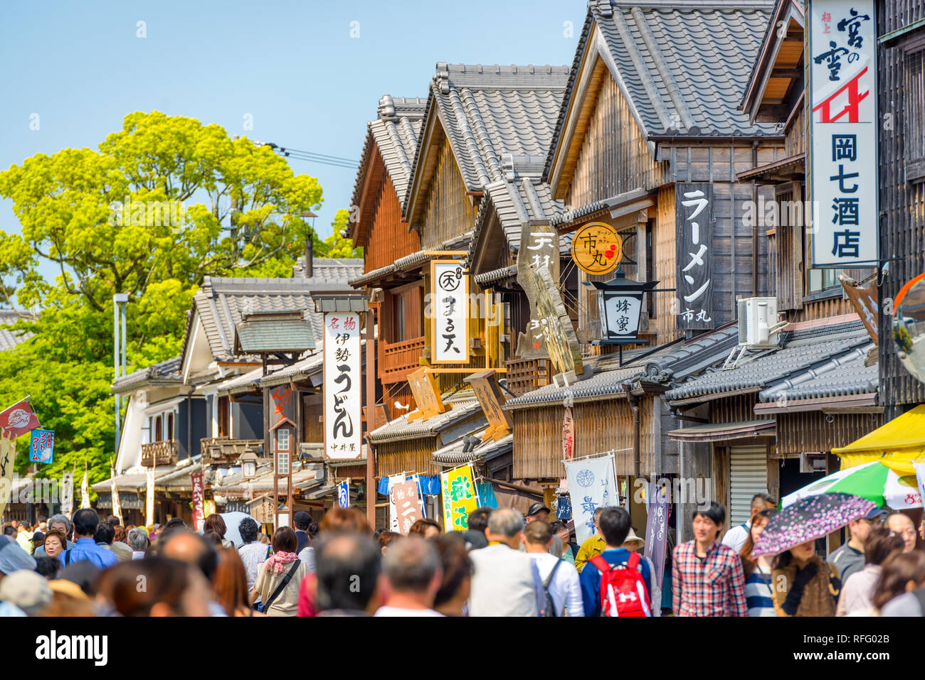 ISE, JAPAN - APRIL 25, 2014: Crowds walk on the historic shopping street of Oharai-machi. The reconstructed buildings are completed in the Edo period  Stock Photo
