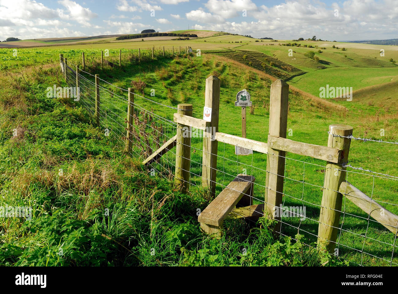 Footpath stile leading onto open access land in Calstone Coombes. Stock Photo