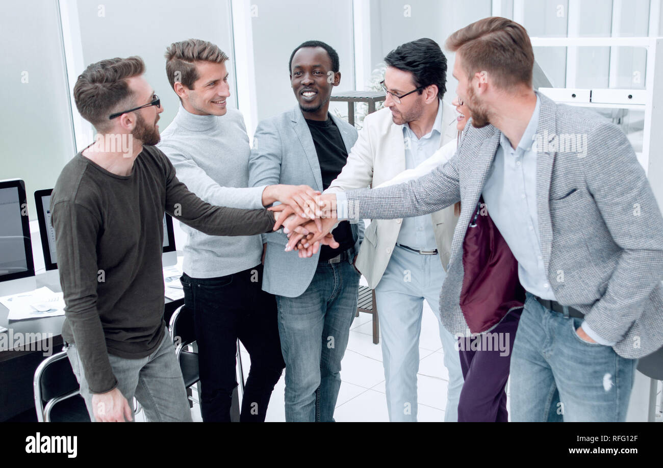professional business team showing their unity Stock Photo - Alamy