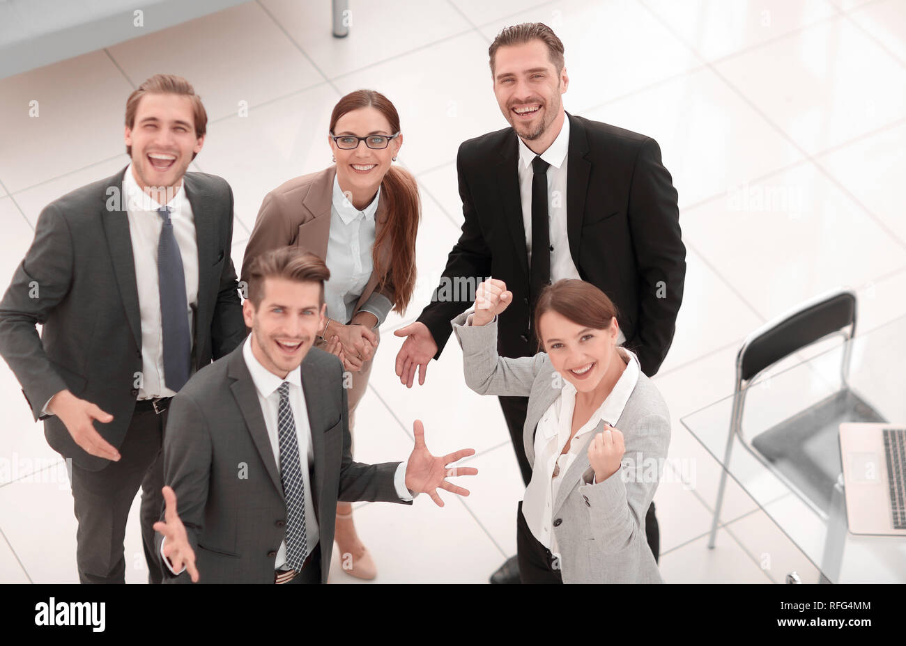 from the top view.happy business team standing in office Stock Photo ...