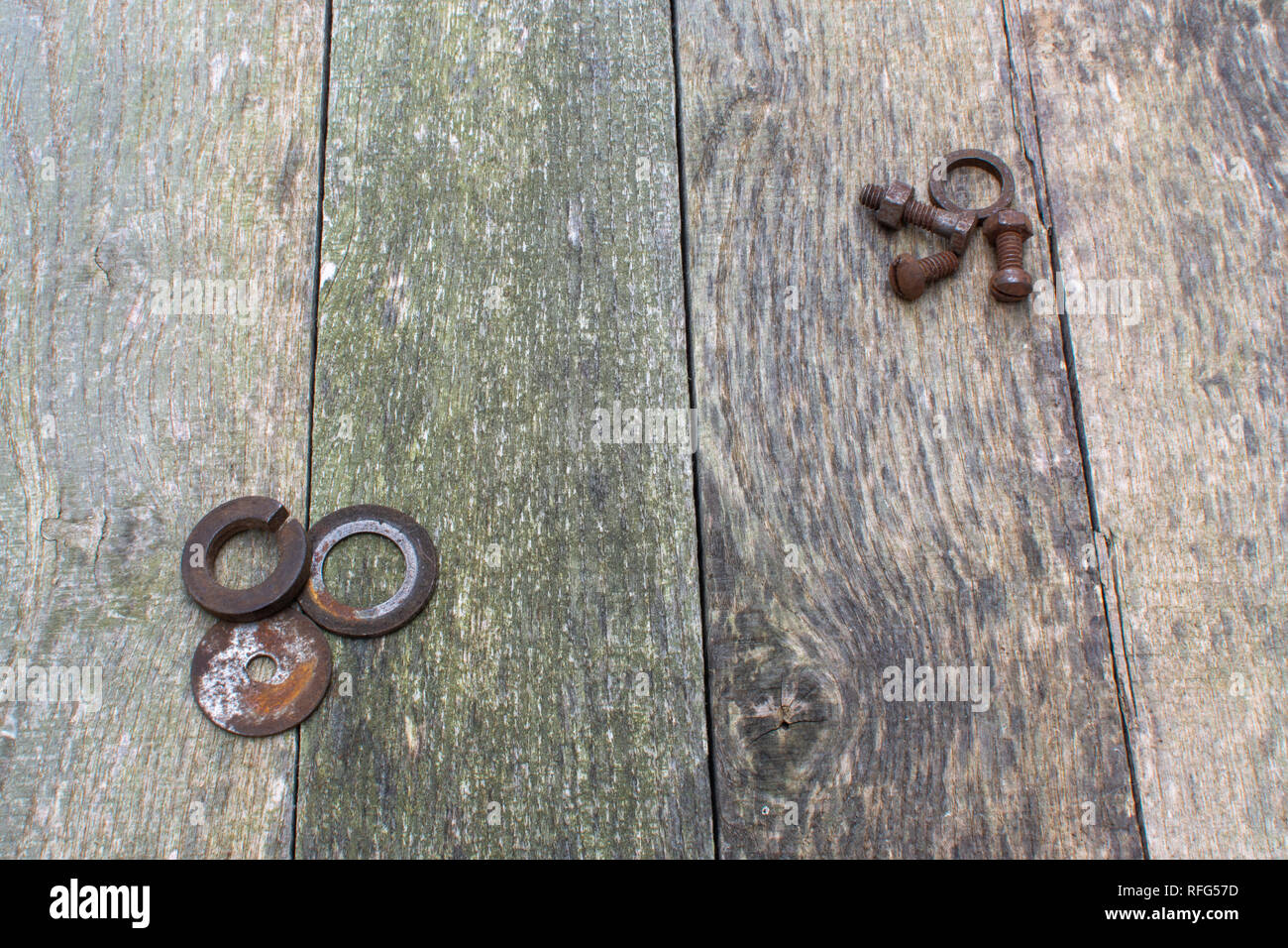 Rusty Washers Weathered pallet wood boards aligned vertically as a background with ...