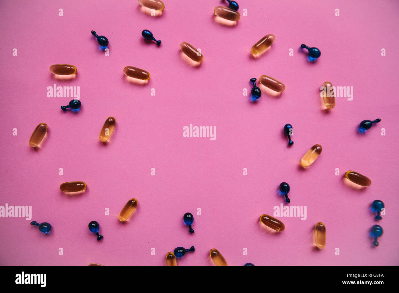 Capsule background with Omega 3, hyaluronic acid. Caring for the health