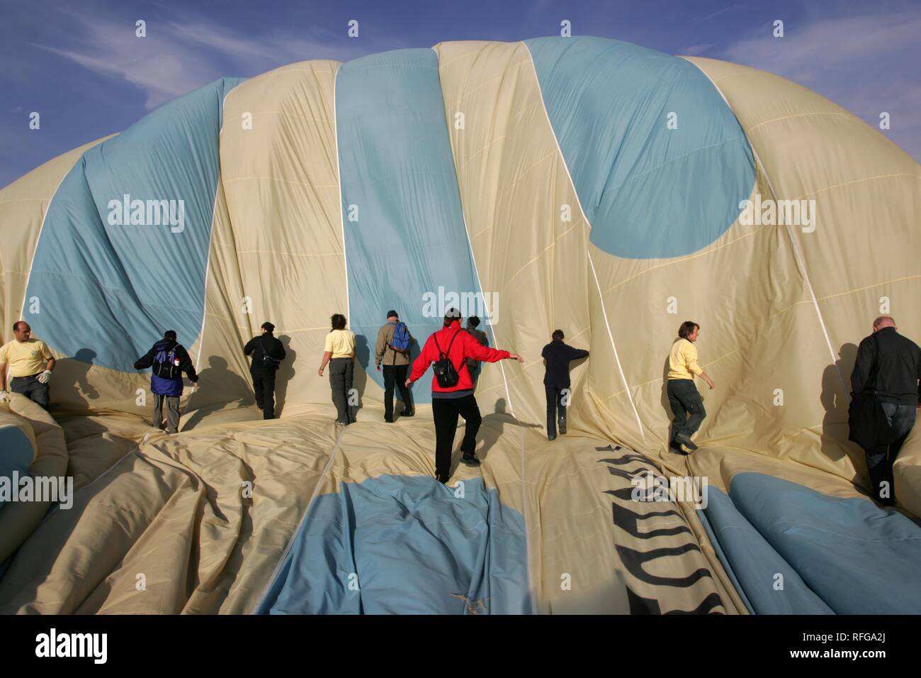 TUR Turkey Cappadocia Hot Air Ballooning over Cappadocia. Balloons of 'Kapadokya Balloons'. Landing Stock Photo