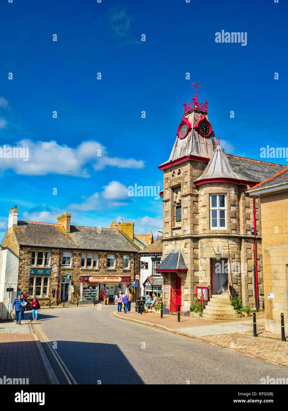 14 June 2018: Marazion, Cornwall, UK - The village centre in summer, with the Town Hall and its clock tower. Stock Photo