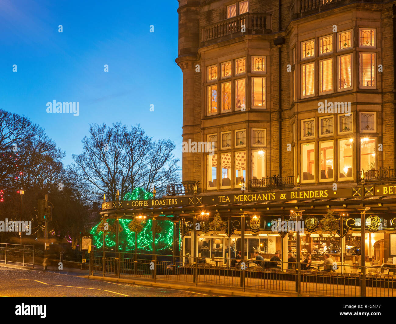 Bettys Tea Rooms at dusk from Parliament Street Harrogate North Yorkshire England Stock Photo