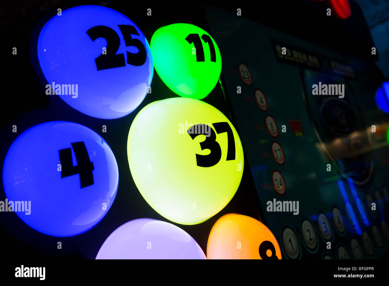 Colourful illuminated bingo balls. Gambling machine and euqipment Stock