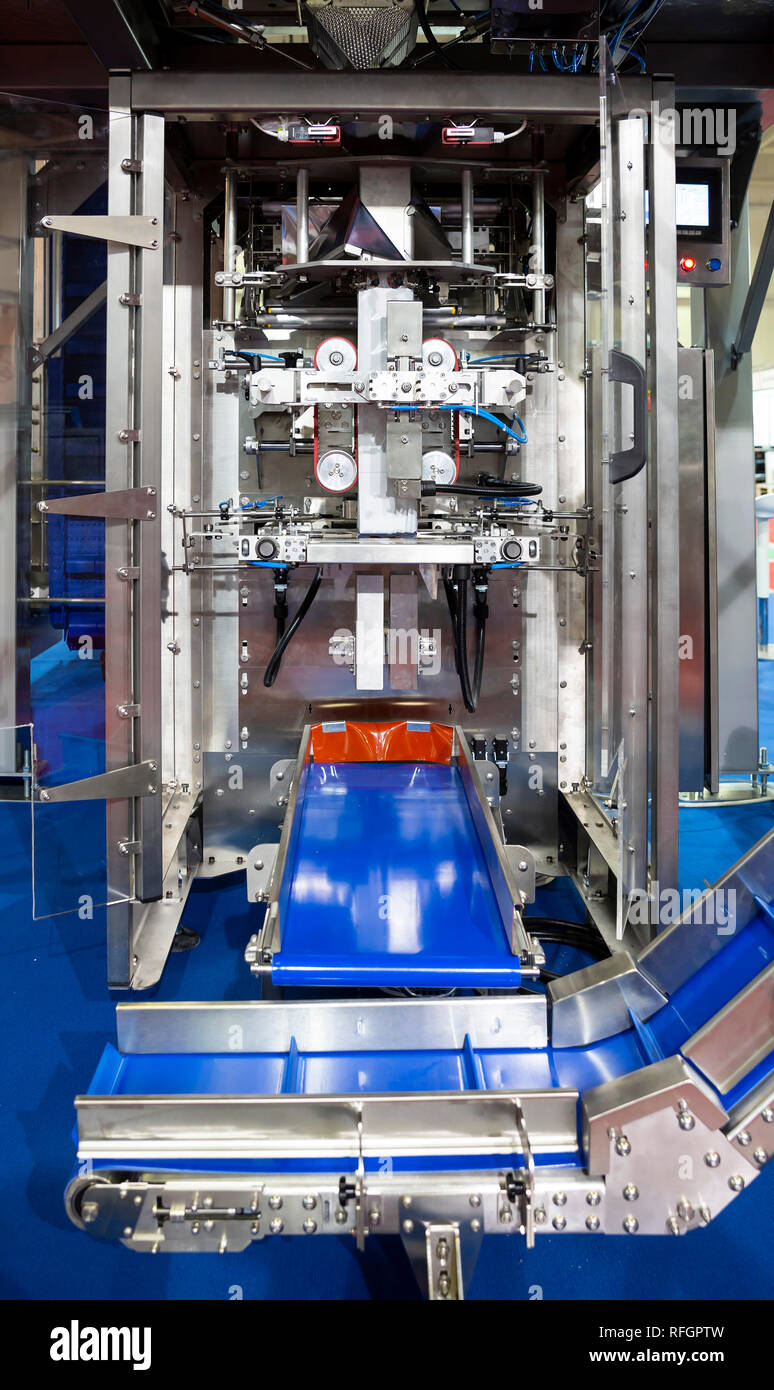 Packing machine is shown at a food and drink exhibition Stock Photo Alamy