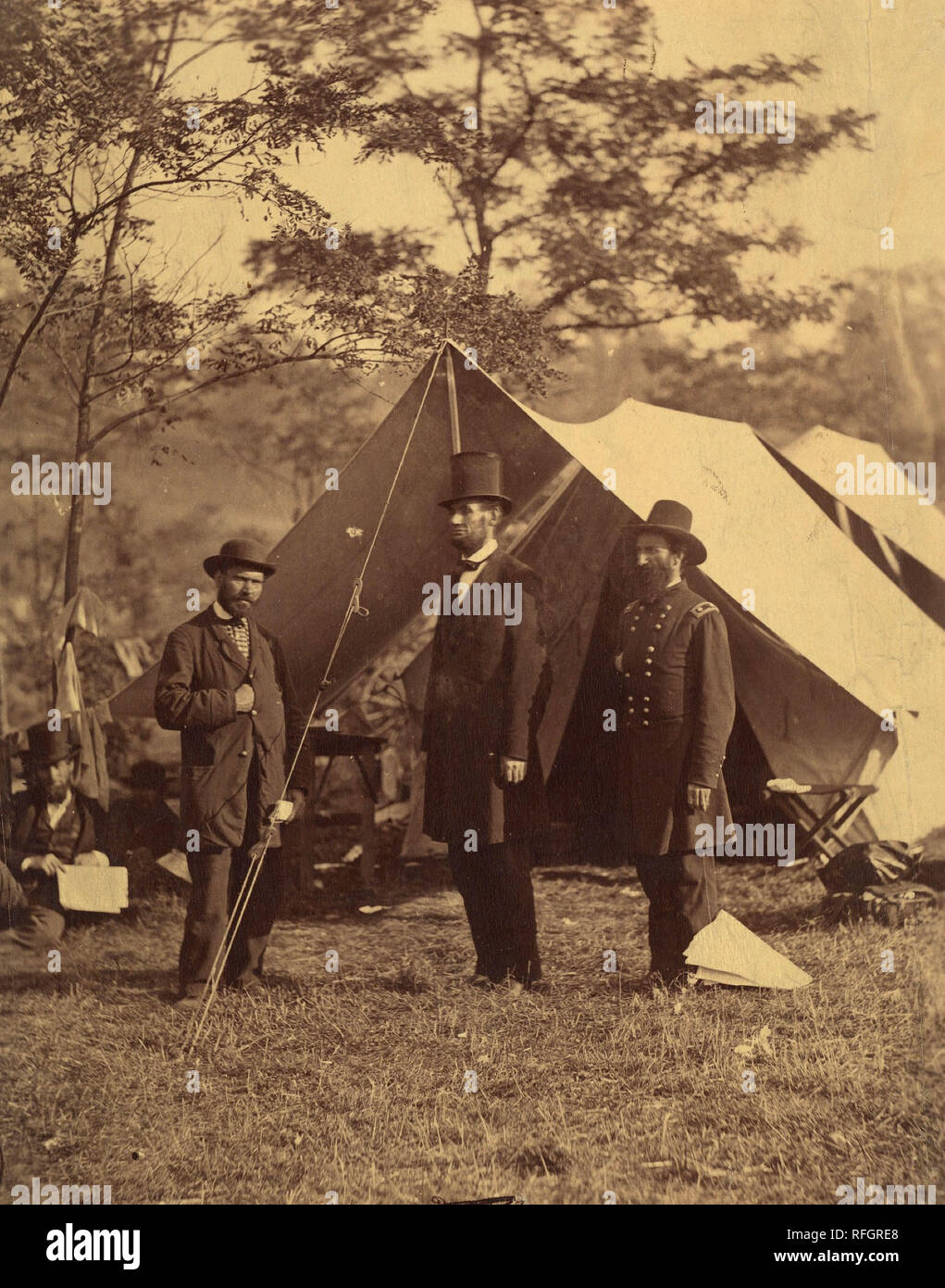 [President Abraham Lincoln, Major General John A. McClernand (right), and E. J. Allen (Allan Pinkerton, left), Chief of the Secret Service of the United States, at Secret Service Department, Headquarters Army of the Potomac, near  Antietam, Maryland]. Artist: Alexander Gardner (American, Glasgow, Scotland 1821-1882 Washington, D.C.). Dimensions: Image: 22.4 x 18 cm (8 13/16 x 7 1/16 in.)  Mount: 29.2 x 20.7 cm (11 1/2 x 8 1/8 in.). Person in Photograph: Abraham Lincoln (American, Hardin County, Kentucky 1809-1865 Washington, D.C.); John Alexander McClernand (American, Breckinridge County, Kent Stock Photo