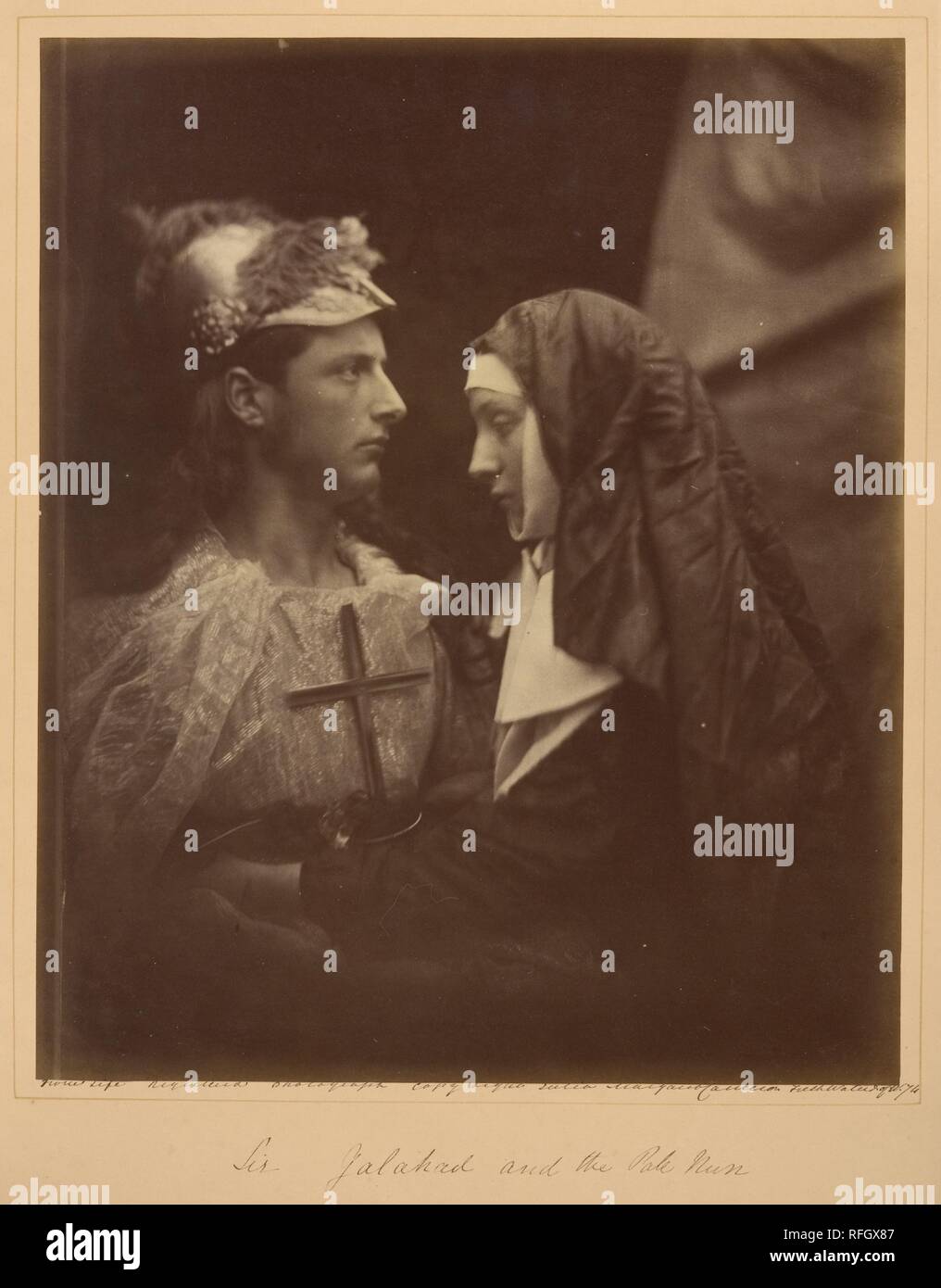 Sir Galahad and the Pale Nun. Artist: Julia Margaret Cameron (British (born India), Calcutta 1815-1879 Kalutara, Ceylon). Dimensions: 33.2 x 27.5 cm (13 1/16 x 10 13/16 in. ). Date: 1874.  In 1874 Tennyson asked Cameron to make photographic illustrations for a new edition of his Idylls of the King, a recasting of the Arthurian legends. Responding that both knew that 'it is immortality to me to be bound up with you,' Cameron willingly accepted the assignment. Costuming family and friends, she made some 245 exposures to arrive at the handful she wanted for the book. Ultimately--and predictably-- Stock Photo