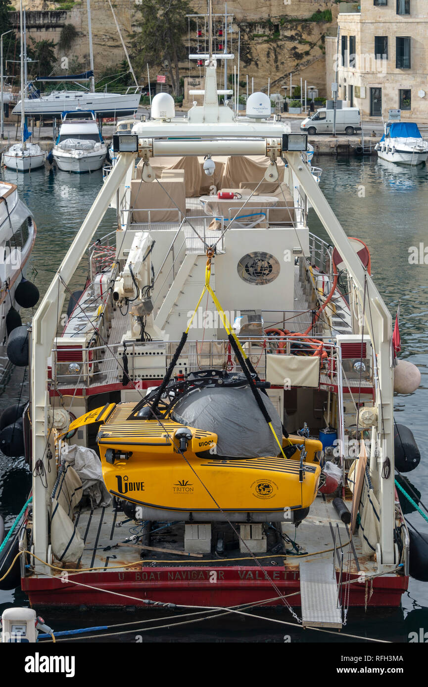 Mini Submarine On The Stern Of A Vessel Moored In Valletta Malta Stock Photo Alamy
