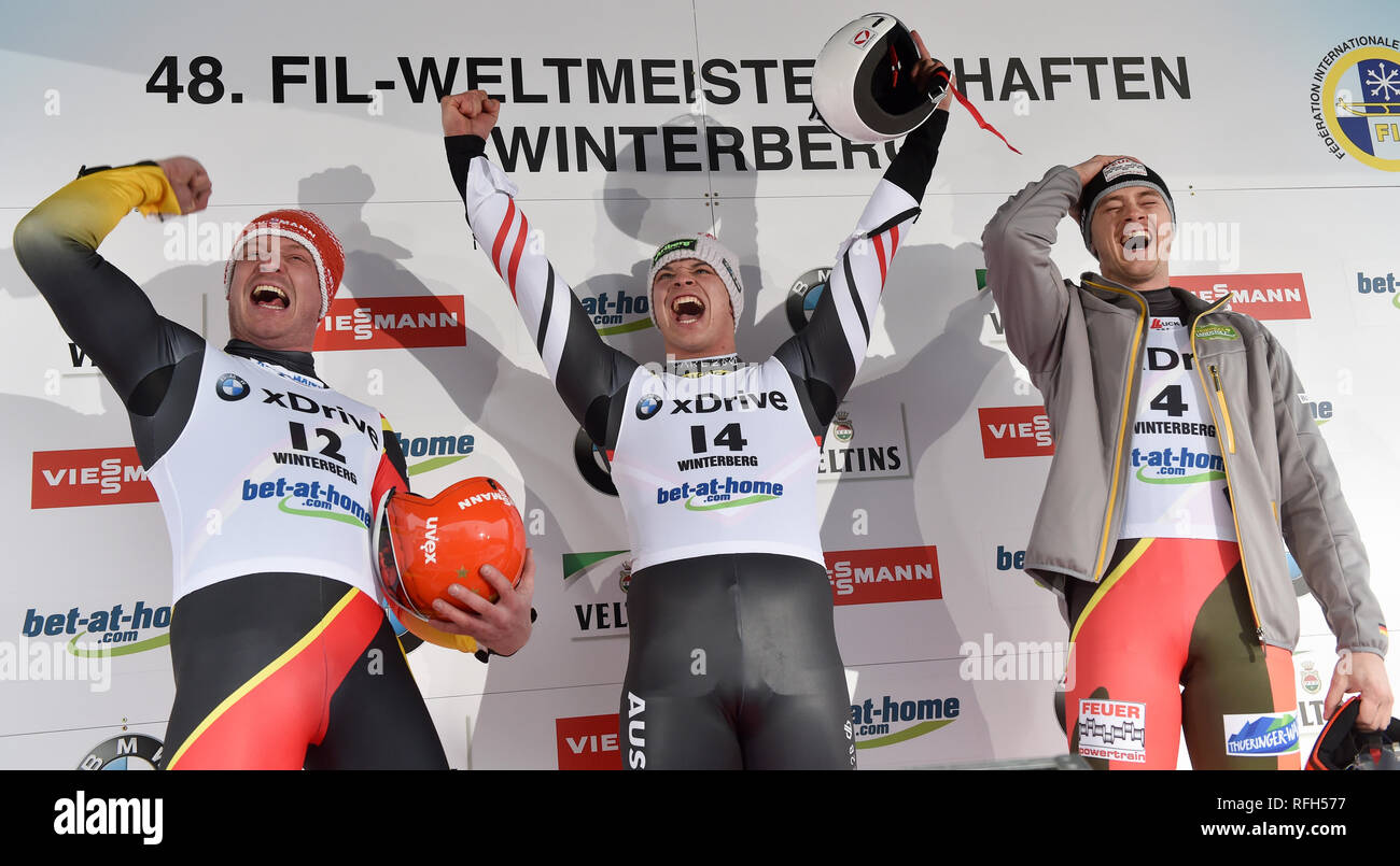 Winterberg, Germany. 25th Jan, 2019. Sprint, men, artificial track in Winterberg: luge athlete Felix Loch (l-r) from Germany and Austrian Jonas Müller celebrate their placings, Johannes Ludwig finishes fourth. Credit: Caroline Seidel/dpa/Alamy Live News Stock Photo