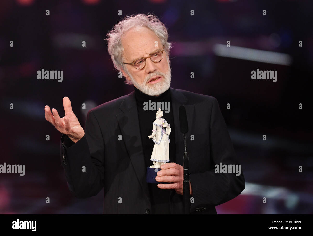 25 January 2019, Bavaria, München: Markus Imhoof, Swiss film director, is awarded the Bavarian Film Prize at the Prinzregententheater. Imhoof was awarded the documentary film prize for the film 'Eldorado'. Photo: Tobias Hase/dpa Stock Photo